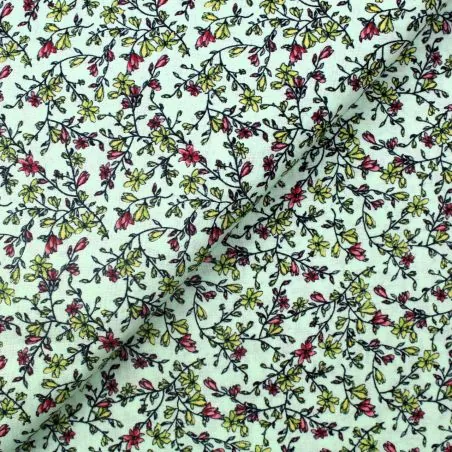 Tissu coton vert amande imprimés fleuris