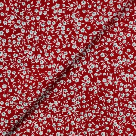 Tissu popeline de coton rouge imprimé fleuri blanc