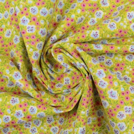 Tissu coton jaune imprimé fleuri