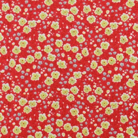 Tissu coton rouge imprimé fleuri jaune