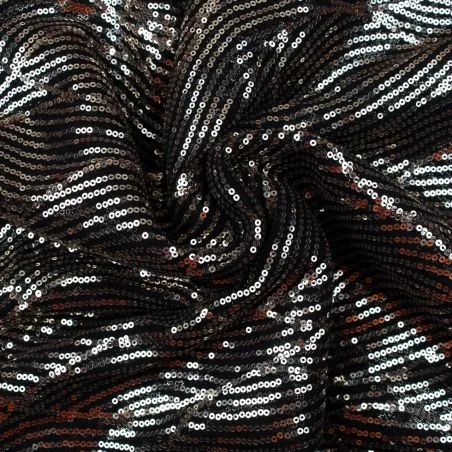 Tissus couture noir paillette or
